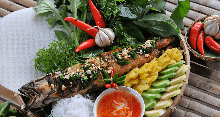 Thưởng thức cá lóc nướng trui miền Tây