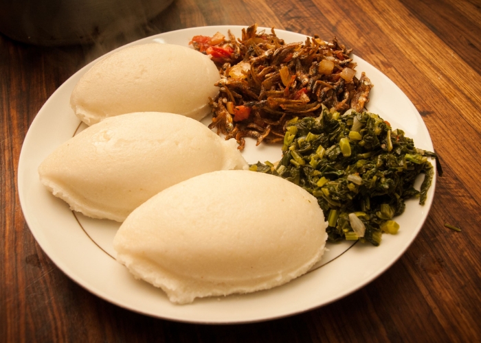 Du lịch Zambia - Nsima thường được ăn kèm với các món hầm, rau củ hoặc thịt nướng